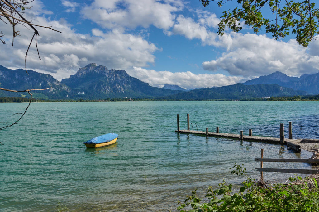Forggensee Allgäu Boot blaiuer Himmel